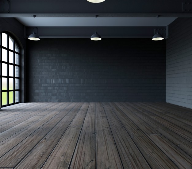 تصویر استوک اتاق کم نور با کف چوبی